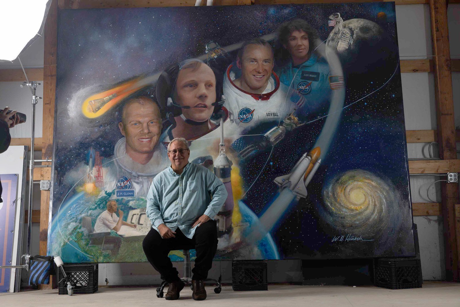 William in his studio with the finished, unframed Ohioans in Space canvas
